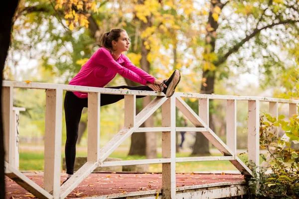 Attractive Beautiful Girl Stretching Bridge Park All Alone — Stock Photo, Image