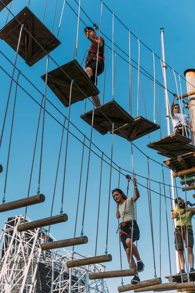 stock image Teenagers doing the courses in the adventure park