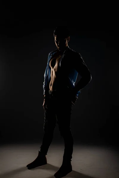 Sideview Handsome Model Taking His Shirt Posing Studio — Stok fotoğraf