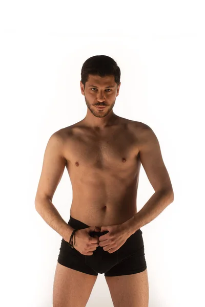 Attractive Sexy Man Studio Making Seductive Poses Touching Himself — Stockfoto