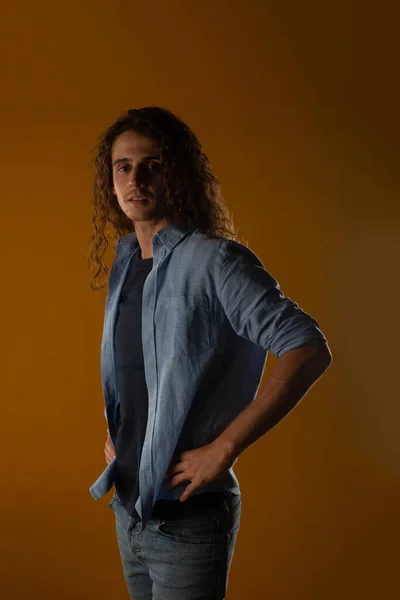 Handsome Curly Haired Man Posing Studio — Stock Photo, Image