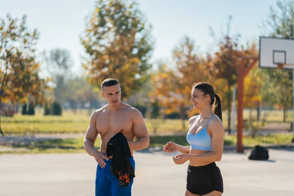 Attractive Sporty Couple Walking Having Conversation Jogging Park —  Fotos de Stock