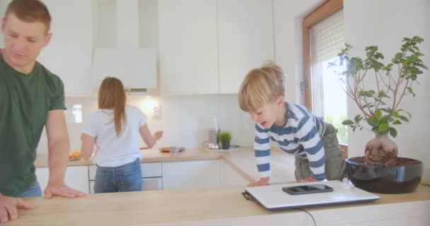 Kid Father Having Fun Time Counter While Mother Making Breakfast — Stockvideo