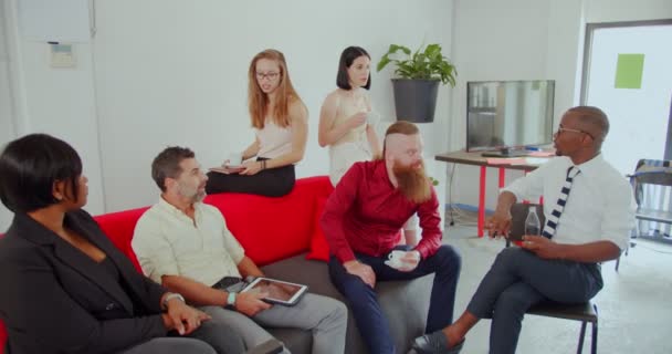 Multiracial Business People Sitting Couch While Having Conversation Drinking Coffee — Video Stock