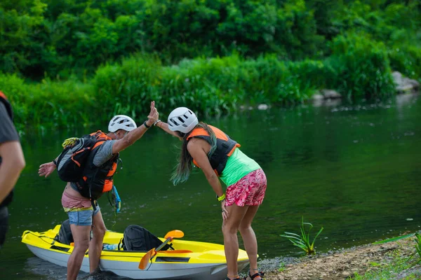 Two Senior Male Female Kayakers Giving Each Other High Five — Stock Photo, Image