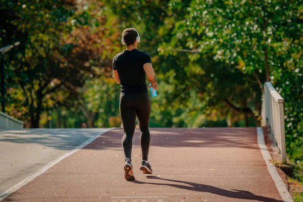 Coureur Masculin Fait Jogging Sur Une Piste Sport Rouge Avec — Photo