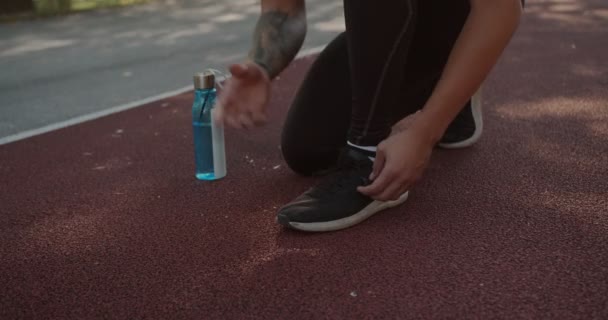 Man Tying Sneakers Laces Running Low Angle Sunset Autumn Scene — Stock Video