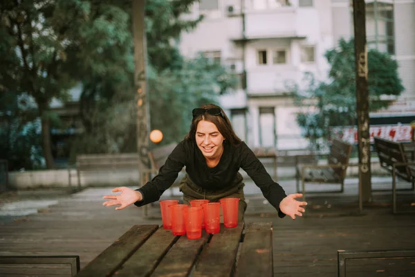 stock image Close up of a pretty brunette  girl expecting the ball to get to the cups while standing at the park