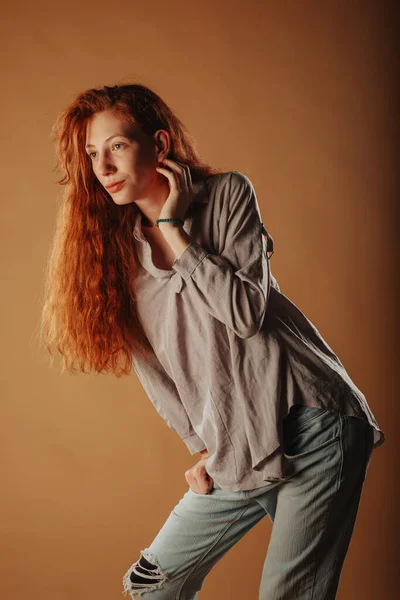 Cute Ginger Girl Posing Studio Front Orange Backround — Stock Photo, Image