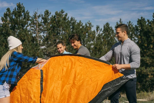 Close Four Hikers Making Orange Tent Mountain — Stock Photo, Image