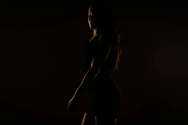 Sporty Woman Looking While Posing Studio She Wearing Black Dress — Stock Photo, Image