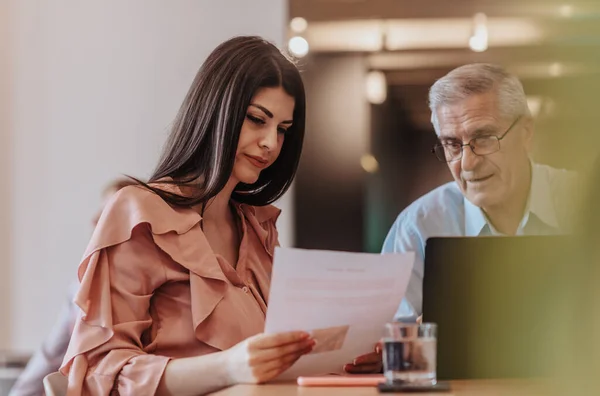 Different Aged Business Partners Discussing Paperwork While Working Together Office — Stock Photo, Image
