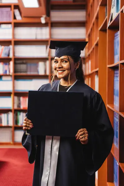 Young Happy Beautiful Female Graduate Wearing Her Cap Gown While — Stock Photo, Image