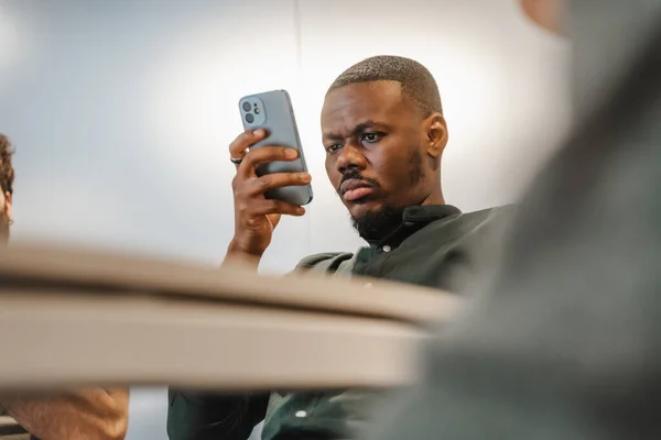 Handsome Male Person Reading Unwanted News His Phone — Stock Photo, Image