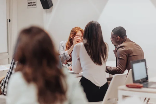 Ginger Female Person Explaining Something Her Multiracial Coworkers Discussing Paperwork — Stock Photo, Image