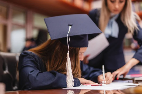 Close Female Graduation Student Writing Her Personal Information Sheet Paper — Stock Photo, Image