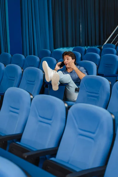 Male Student Sitting Empty Conference Room His Legs Chair School — Stock Photo, Image