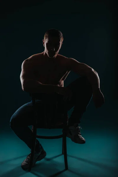 Front View Shot Shirtless Guy Sitting Chair Posing Studio Silhouette — Stock Photo, Image