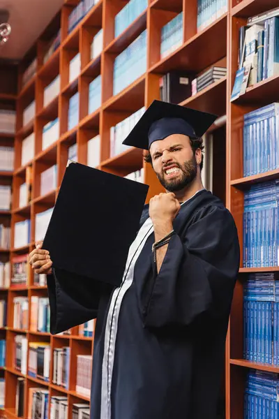 Young Excited Graduate Wearing Cap Gown Celebrates Getting His Bachelor — Stock Photo, Image