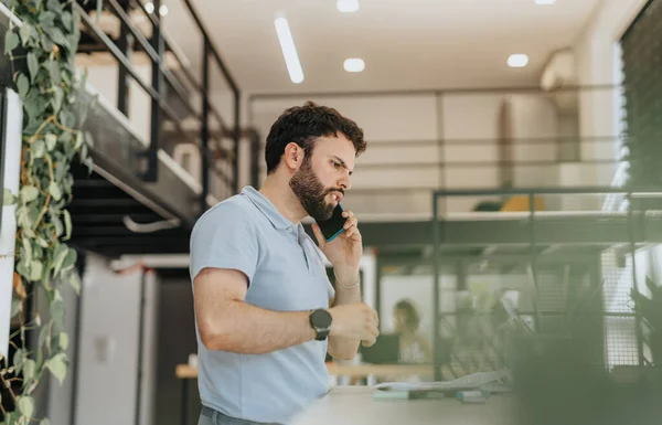 Angry and disappointed project team leader calling his remote colleagues at meeting during phone call after they did a big mistake at the project.