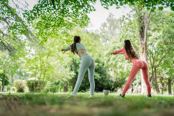 Two Active Women Exercise Park Stretching Enjoying Outdoor Workout Together — Stock Photo, Image