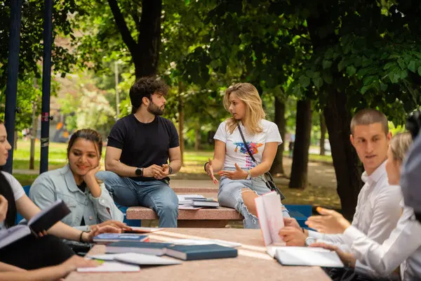 Diverse Group University Students Engaged Lively Discussion Comparing Exam Answers — Stock Photo, Image