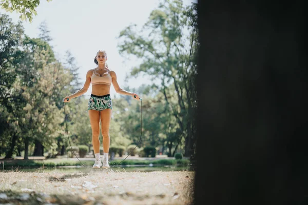 Woman Jump Rope Exercise Outdoors Park Enjoying Sunny Day She — Stock Photo, Image