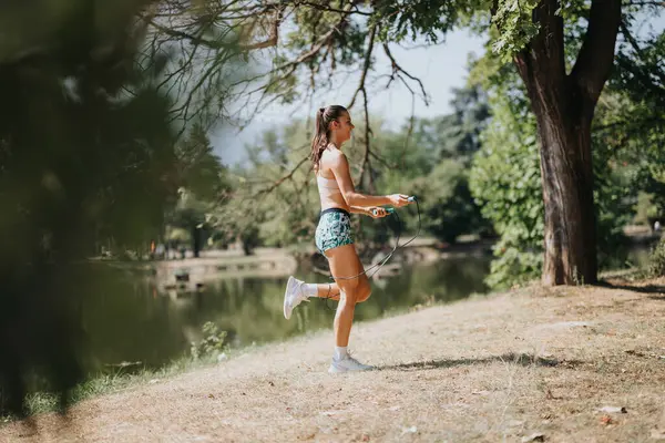 Woman Jumping Rope Park Happy Active Young Woman Exercising Outdoors — Stock Photo, Image