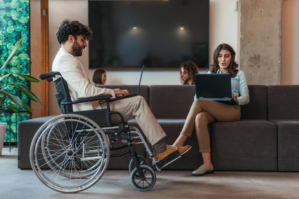 Male Employee Disability Wheelchair Working Lap Top Having Conversation His — Stock Photo, Image
