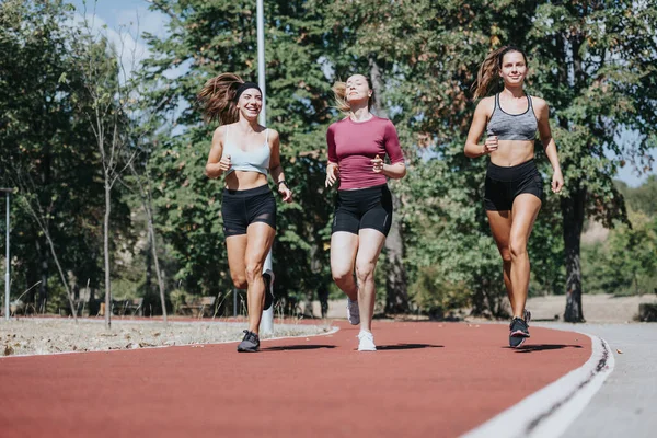 Active Athletic Girls Jogging Outdoors City Park Enjoying Sunny Day — Stock Photo, Image