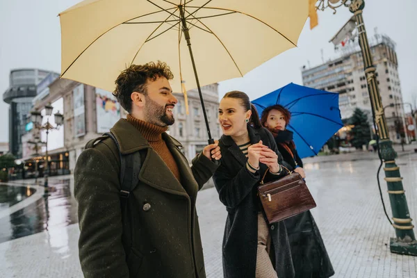 Group Business Partners Discussing Project Outdoors While Carrying Umbrellas Rainy — Stock Photo, Image