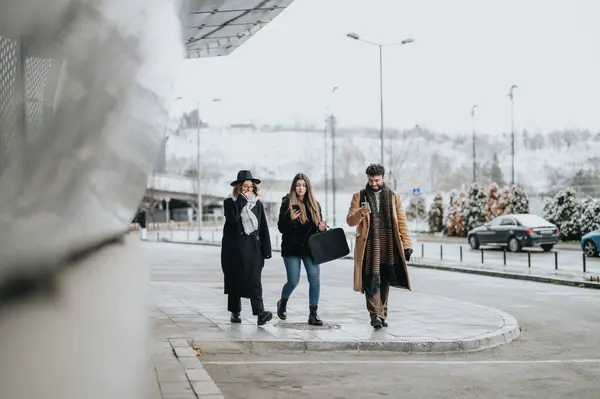 Young Multicultural Business Team Collaborates Walk Snowy Urban Landscape Exuding — Stock Photo, Image