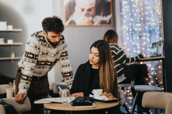 Young People Collaborating Cozy Cafe Environment Festive Lights — Stock Photo, Image