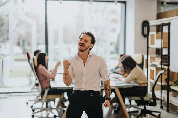 Successful Young Businessman Celebrating Victory Modern Office — Stock Photo, Image
