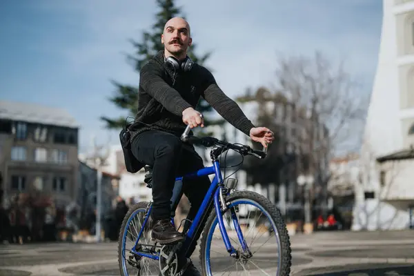 Man Beard Wearing Sweater Headphones Rides Blue Bicycle Sunny City — Stock Photo, Image