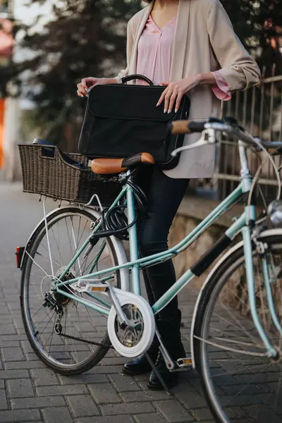 A businesswoman in smart casual attire prepares to ride her vintage bicycle, exuding urban eco-friendly commuting and work-life balance.