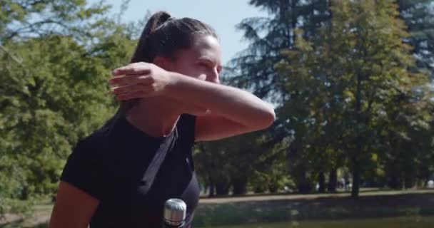 Female Athlete Taking Break Drink Water Sports Bottle While Training — Stock Video