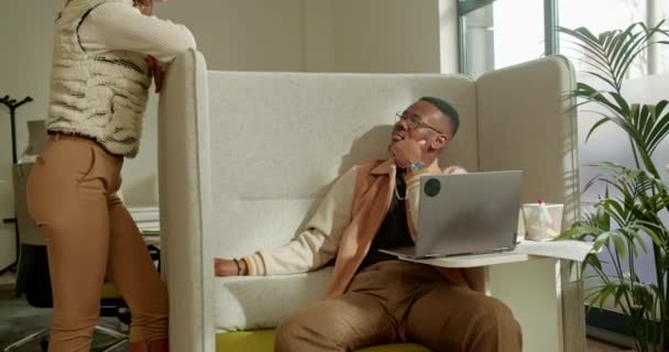 Focused Male Entrepreneur Smart Casual Attire Works Laptop Office Lounge — Stock Video