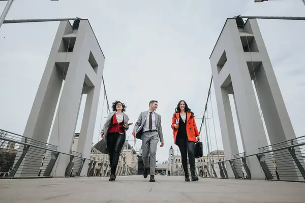 Three lawyers in formal attire walking outside after a successful business meeting, depicting leadership and teamwork.