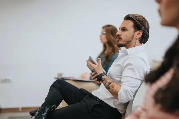 Young Tattooed Businessman Smart White Shirt Engaging Intently Professional Meeting — Stock Photo, Image
