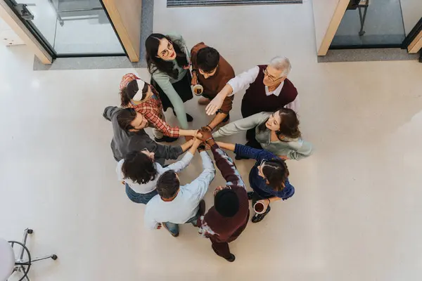 Aerial View Multigenerational Group Holding Hands Forming Circle Indoor Setting — Stock Photo, Image