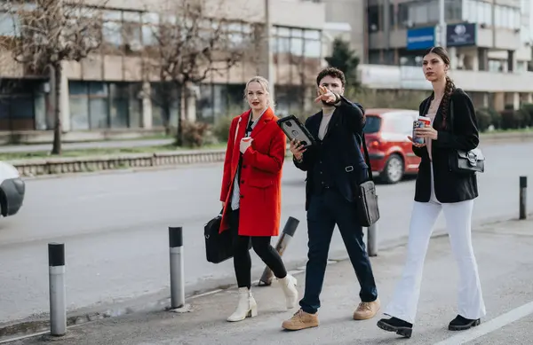 Three Professionals Business Attire Walking City Sidewalk Exuding Confidence Purpose — Stock Photo, Image