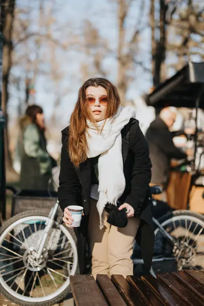 Young Woman Sunglasses Enjoying Sunny Winter Day Outdoors Holding Coffee — Stock Photo, Image