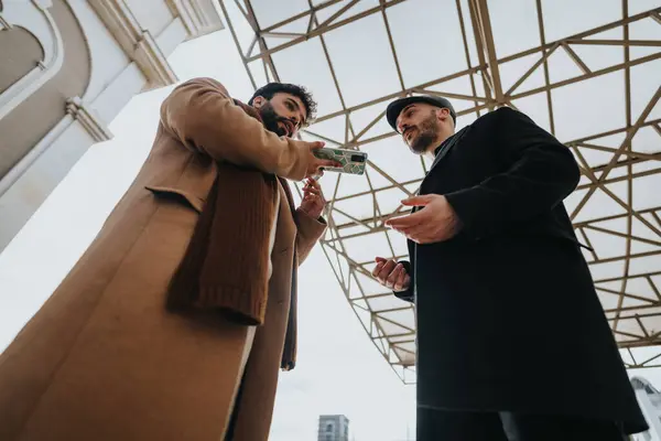 Two Stylish Men Exchanging Money Geometric Shelter Outdoors — Stock Photo, Image