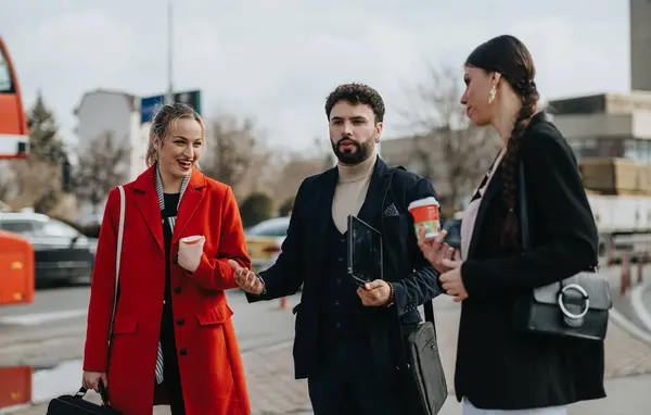 Three Young Professionals Enjoying Casual Conversation While Walking Outdoors Urban — Stock Photo, Image