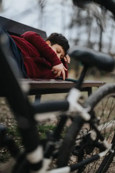 Joyful Young Kid Takes Break Outdoors Leaning Bench His Bicycle — Stock Photo, Image
