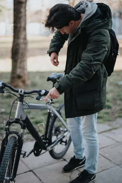 Young Casual Man Inspecting Locking His Mountain Bike City Park — Stock Photo, Image