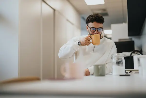 Handsome Man Taking Break Work Taking Sip His Tea While — Stock Photo, Image