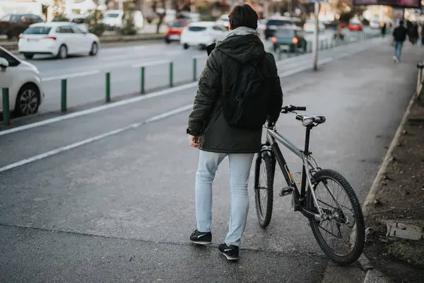 Rear View Male Commuter Backpack Standing His Bike Busy Street — Stock Photo, Image