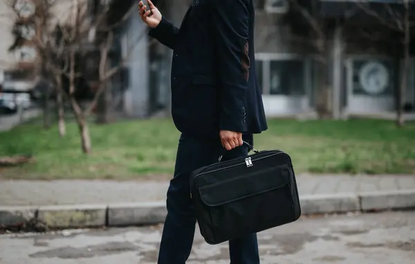 Confident Male Professional Strides City Sidewalk Holding Sleek Briefcase His — Stock Photo, Image